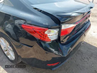 2013 Lexus ES 300h with VIN JTHBW1GG3D2021031, listed as a IAAI auction lot 42668452 with 265,788 mi miles and . Bid and sale history available at DreamBid. Image 6.