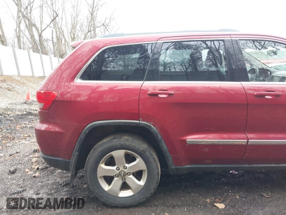 2012 Jeep Grand Cherokee Laredo with VIN 1C4RJFAG7CC123669, listed as a IAAI auction lot 42001472 with 164,806 mi miles. Bid and sale history available at carsss.com. Image 21.