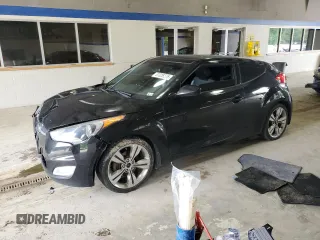 2013 Hyundai Veloster w/Black Int z VIN KMHTC6AD1DU175862, wystawiony jako Copart lot #57326275 z przebiegiem 192 782 mil mil oraz Czysty tytuł • Clean title. Historia ofert i sprzedaży dostępna na DreamBid. Obrazek 1.