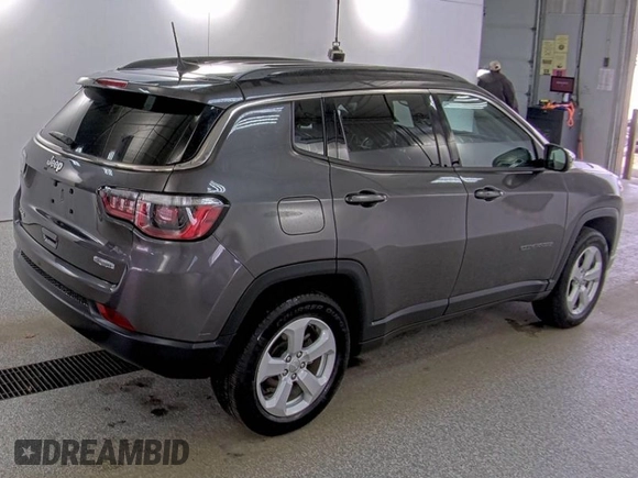 2020 Jeep Compass Latitude z VIN 3C4NJDBB8LT214802, wystawiony jako IAAI lot #42088293 z przebiegiem 89 389 mil mil oraz . Historia ofert i sprzedaży dostępna na DreamBid. Obrazek 1.