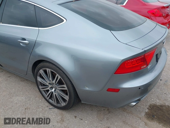 2013 Audi A7 Premium Plus with VIN WAUYGAFC1DN069906, listed as a IAAI auction lot 41906962 with 203,149 mi miles and . Bid and sale history available at DreamBid. Image 6.