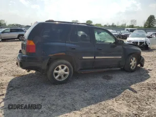 2004 GMC Envoy SLT with VIN 1GKDT13S342188670, listed as a Copart auction lot 59080825 with 334,233 mi miles and Salvage title. Bid and sale history available at DreamBid. Image 3.