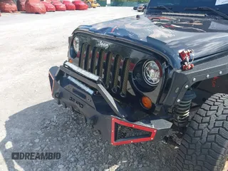 2012 Jeep Wrangler Sport z VIN 1C4AJWAG2CL286680, wystawiony jako IAAI lot #42434411 z przebiegiem 97 142 mil mil oraz . Historia ofert i sprzedaży dostępna na DreamBid. Obrazek 6.