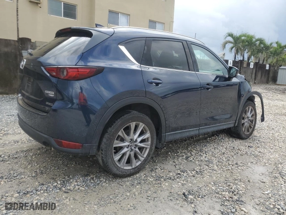 2021 Mazda CX-5 Grand Touring Reserve with VIN JM3KFBAY0M0414464, listed as a Copart auction lot 45245935 with 24,549 mi miles and Non Repairable. Bid and sale history available at carsss.com. Image 3.