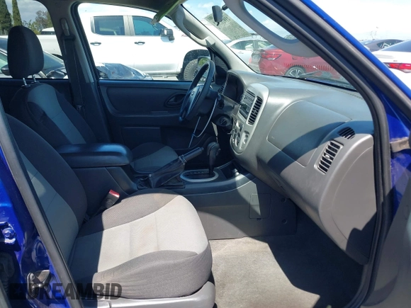 2005 Ford Escape XLS Value with VIN 1FMYU02Z85KD90338, listed as a IAAI auction lot 41916569 with 174,870 mi miles. Bid and sale history available at carsss.com. Image 5.