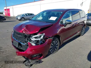 2023 Chrysler Pacifica Hybrid Limited with VIN 2C4RC1S7XPR518695, listed as a IAAI auction lot 41301401 with 24,433 mi miles and . Bid and sale history available at DreamBid. Image 6.