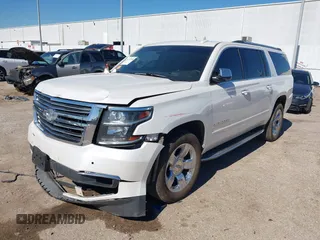2016 Chevrolet Suburban LTZ with VIN 1GNSCJKC0GR135103, listed as a IAAI auction lot 41372158 with 167,540 mi miles and . Bid and sale history available at DreamBid. Image 2.