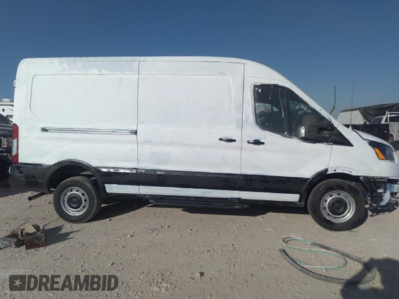 2024 Ford Transit Cargo with VIN 1FTBR1C82RKA26803, listed as a IAAI auction lot 40440250 with 1,197 mi miles and . Bid and sale history available at DreamBid. Image 13.