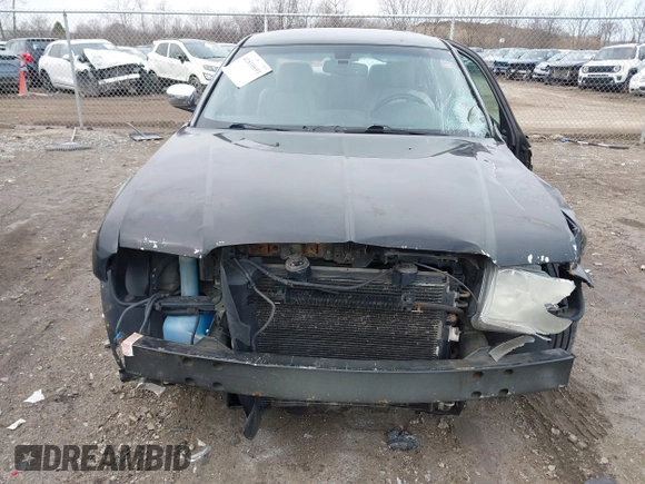 2006 Chrysler 300 C with VIN 2C3KA63H06H189591, listed as a IAAI auction lot 41810691 with 184,465 mi miles. Bid and sale history available at carsss.com. Image 13.