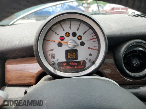 2007 MINI Hardtop with VIN WMWMF33537TL77985, listed as a Copart auction lot 61908635 with 180,470 mi miles and Salvage title. Bid and sale history available at DreamBid. Image 9.
