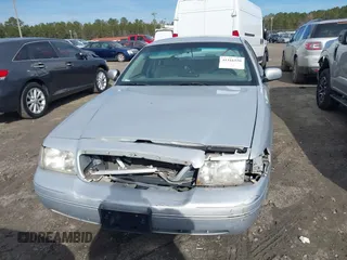 2002 Ford Crown Victoria LX z VIN 2FAFP74W42X100691, wystawiony jako IAAI lot #41316550 z przebiegiem 193 517 mil mil oraz . Historia ofert i sprzedaży dostępna na DreamBid. Obrazek 11.