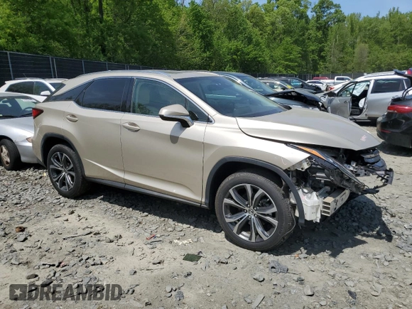 2019 Lexus RX 350 z VIN JTJBZMCA5K2041190, wystawiony jako Copart lot #52142425 z przebiegiem 35 741 mil mil oraz Szkody całkowita. Historia ofert i sprzedaży dostępna na DreamBid. Obrazek 4.