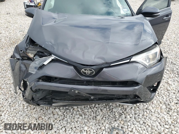 2018 Toyota RAV4 XLE with VIN 2T3WFREV6JW515146, listed as a Copart auction lot 43525825 with 73,257 mi miles and Salvage Title. Bid and sale history available at carsss.com. Image 14.