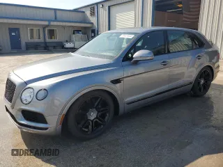 2019 Bentley Bentayga V8 z VIN SJAAM2ZV4KC024727, wystawiony jako Copart lot #80631684 z przebiegiem 38 304 mil mil oraz Nie do naprawy. Historia ofert i sprzedaży dostępna na DreamBid. Obrazek 2.