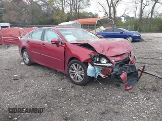 2014 Lexus ES 330 with VIN JTHBK1GGXE2085161, listed as a IAAI auction lot 41946688 with 169,599 mi miles and . Bid and sale history available at DreamBid. Image 1.