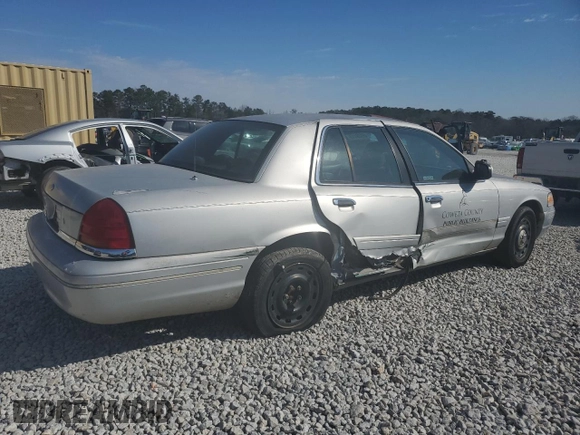 2003 Ford Police Interceptor Street Appear with VIN 2FAFP71W33X109470, listed as a Copart auction lot 46928115 with 239,164 mi miles and Salvage title. Bid and sale history available at DreamBid. Image 3.