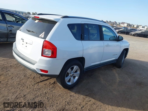 2011 Jeep Compass with VIN 1J4NT1FA5BD289644, listed as a IAAI auction lot 41320876 with 149,938 mi miles. Bid and sale history available at carsss.com. Image 4.