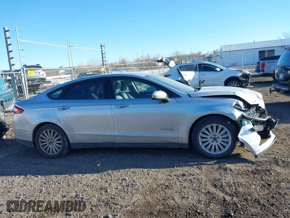 2015 Ford Fusion S Hybrid with VIN 3FA6P0UU7FR307568, listed as a IAAI auction lot 41421139 with 152,186 mi miles. Bid and sale history available at carsss.com. Image 14.