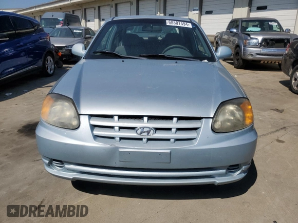 2003 Hyundai Accent GL with VIN KMHCG35CX3U274974, listed as a Copart auction lot 68807494 with 133,791 mi miles and Non Repairable. Bid and sale history available at carsss.com. Image 5.