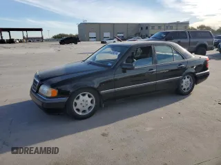 1994 Mercedes-Benz C with VIN WDBHA28E5RF090458, listed as a Copart auction lot 82380184 with Not Provided miles and Salvage Title. Bid and sale history available at carsss.com. Image 1.