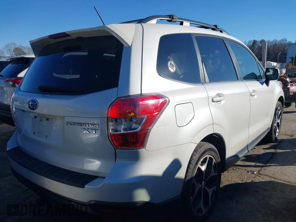 2014 Subaru Forester XT Touring with VIN JF2SJGPC9EH417920, listed as a IAAI auction lot 41270689 with 184,976 mi miles and . Bid and sale history available at DreamBid. Image 4.