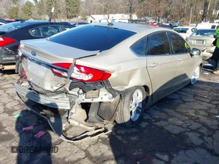 2018 Ford Fusion SE z VIN 3FA6P0LU4JR197153, wystawiony jako IAAI lot #41184755 z przebiegiem Nie podano mil oraz . Historia ofert i sprzedaży dostępna na DreamBid. Obrazek 4.