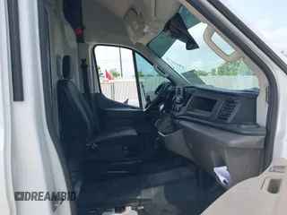 2023 Ford Transit Cargo z VIN 1FTLW3X86PKC12960, wystawiony jako IAAI lot #42174156 z przebiegiem 23 420 mil mil oraz . Historia ofert i sprzedaży dostępna na DreamBid. Obrazek 5.