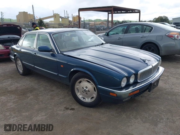 1996 Jaguar XJ with VIN SAJHX1743TC759842, listed as a IAAI auction lot 41778155 with 189,315 mi miles and . Bid and sale history available at DreamBid. Image 1.