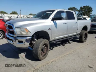 2012 Ram 2500 Laramie Longhorn с VIN 3C6UD5GL5CG151569, выставлен на аукционе Copart как лот 65281865 с пробегом 179 556 миль миль и Списание • Salvage title. История ставок и продаж доступна на DreamBid. Изображение 1.