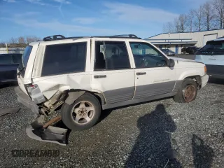 1996 Jeep Grand Cherokee Laredo with VIN 1J4EX58S3TC110154, listed as a Copart auction lot 46947805 with 268,507 mi miles and Salvage Title. Bid and sale history available at carsss.com. Image 3.