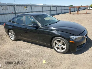 2015 BMW 3 Series 320i xDrive with VIN WBA3C3G57FNS74781, listed as a Copart auction lot 52324455 with 131,924 mi miles and Salvage title. Bid and sale history available at DreamBid. Image 4.