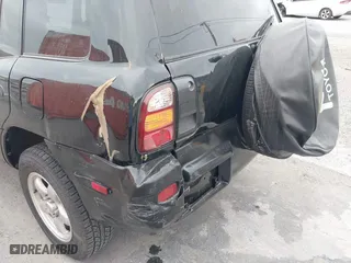 1999 Toyota RAV4 with VIN JT3HP10V5X7120186, listed as a IAAI auction lot 41909578 with 257,200 mi miles. Bid and sale history available at carsss.com. Image 6.