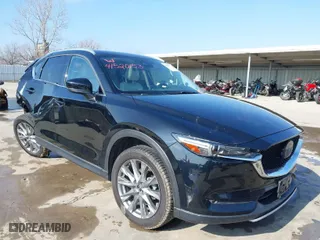 2020 Mazda CX-5 Grand Touring with VIN JM3KFADM9L0760353, listed as a IAAI auction lot 41520153 with NaN miles. Bid and sale history available at carsss.com. Image 1.