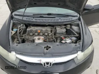 2009 Honda Civic LX z VIN 2HGFA16559H319601, wystawiony jako Copart lot #54408975 z przebiegiem 143 093 mil mil oraz Szkoda całkowita • Salvage title. Historia ofert i sprzedaży dostępna na DreamBid. Obrazek 11.