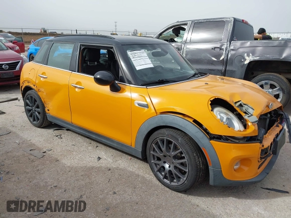 2016 MINI Hardtop 4 Door z VIN WMWXU1C56G2D10006, wystawiony jako IAAI lot #41752731 z przebiegiem 67 844 mil mil oraz . Historia ofert i sprzedaży dostępna na DreamBid. Obrazek 1.