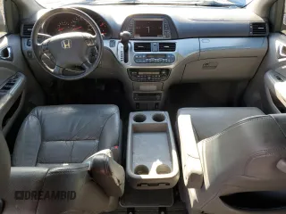 2010 Honda Odyssey EX-L z VIN 5FNRL3H75AB067634, wystawiony jako Copart lot #51538755 z przebiegiem 150 261 mil mil oraz Szkoda całkowita • Salvage title. Historia ofert i sprzedaży dostępna na DreamBid. Obrazek 8.
