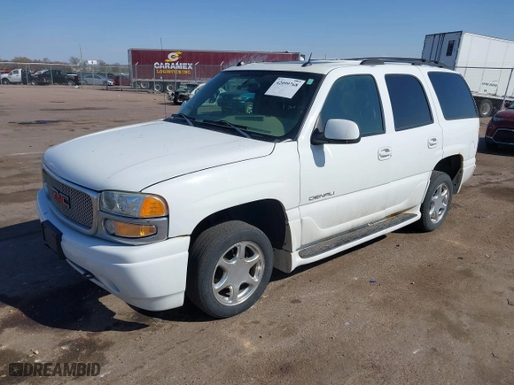 2004 GMC Yukon Denali with VIN 1GKEK63U54J251781, listed as a IAAI auction lot 42099768 with 166,543 mi miles. Bid and sale history available at carsss.com. Image 2.