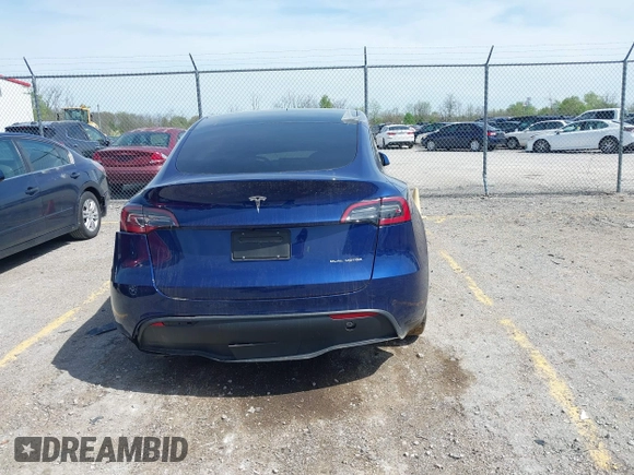 2023 Tesla Model Y Long Range with VIN 7SAYGDEE7PF702051, listed as a IAAI auction lot 42074182 with 50,473 mi miles and . Bid and sale history available at DreamBid. Image 15.
