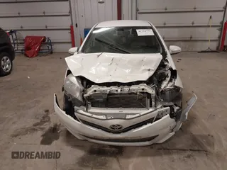 2013 Toyota Yaris L with VIN JTDKTUD33DD566664, listed as a IAAI auction lot 41524571 with 148,050 mi miles and . Bid and sale history available at DreamBid. Image 12.