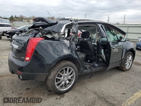 2014 Cadillac SRX Premium Collection z VIN 3GYFNGE31ES688270, wystawiony jako Copart lot #52795245 z przebiegiem 134 103 mil mil oraz Szkoda całkowita • Salvage title. Historia ofert i sprzedaży dostępna na DreamBid. Obrazek 3.