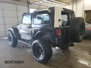 2009 Jeep Wrangler Sahara with VIN 1J4FA54159L772622, listed as a Copart auction lot 55648305 with 141,880 mi miles and Salvage title. Bid and sale history available at DreamBid. Image 2.