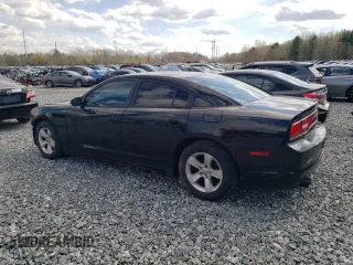 2014 Dodge Charger SE with VIN 2C3CDXBG9EH349301, listed as a Copart auction lot 54000015 with 210,349 mi miles and Clean Title. Bid and sale history available at carsss.com. Image 2.