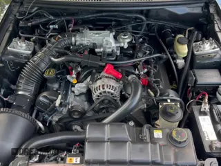 2002 Ford Mustang GT Deluxe с VIN 1FAFP42X22F155128, выставлен на аукционе Copart как лот 80759665 с пробегом 111 132 миль миль и Чистый • Clean title. История ставок и продаж доступна на DreamBid. Изображение 11.