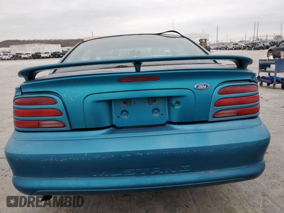 1994 Ford Mustang with VIN 1FALP404XRF140382, listed as a Copart auction lot 82917284 with 89,673 mi miles and Salvage Title. Bid and sale history available at carsss.com. Image 6.