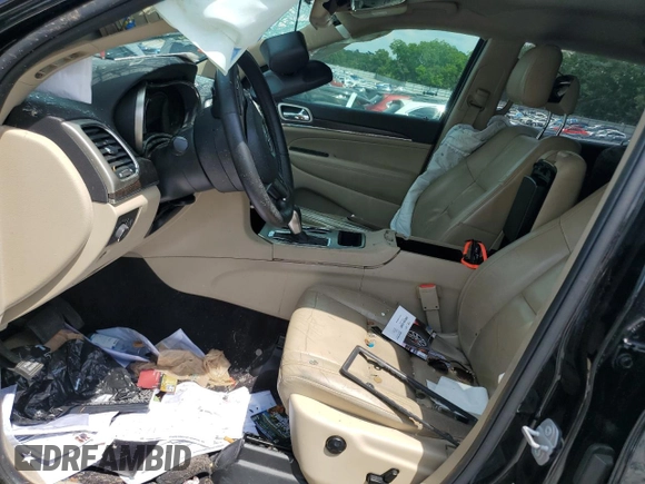 2017 Jeep Grand Cherokee Limited with VIN 1C4RJEBG9HC837822, listed as a Copart auction lot 57498835 with 140,179 mi miles and Salvage title. Bid and sale history available at DreamBid. Image 7.
