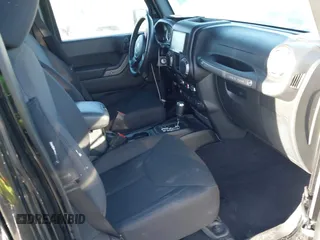2018 Jeep Wrangler JK Unlimited Sport S with VIN 1C4BJWDG7JL818843, listed as a IAAI auction lot 41506058 with 43,563 mi miles. Bid and sale history available at carsss.com. Image 5.