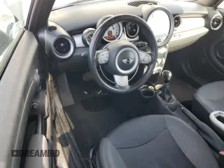 2010 MINI Convertible with VIN WMWMR3C55ATU97172, listed as a Copart auction lot 42726215 with 99,164 mi miles and Salvage Title. Bid and sale history available at DreamBid. Image 8.