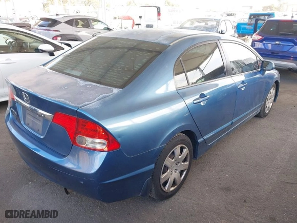 2010 Honda Civic Sdn LX with VIN 2HGFA1F50AH581076, listed as a IAAI auction lot 41945819 with 154,636 mi miles. Bid and sale history available at carsss.com. Image 4.