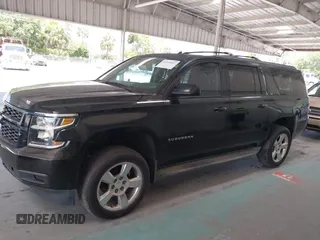 2015 Chevrolet Suburban LT with VIN 1GNSKJKC7FR199544, listed as a IAAI auction lot 42169017 with 219,219 mi miles and . Bid and sale history available at DreamBid. Image 14.