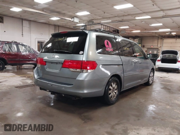 2008 Honda Odyssey EX-L with VIN 5FNRL38738B030818, listed as a IAAI auction lot 41718717 with 247,994 mi miles and . Bid and sale history available at DreamBid. Image 4.